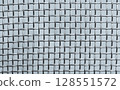 Close-Up of Metallic Wire Mesh Grid in Horizontal and Vertical Lines 128551572