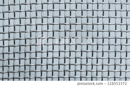 Close-Up of Metallic Wire Mesh Grid in Horizontal and Vertical Lines Close-Up of Metallic Wire Mesh Grid in Horizontal and Vertical Lines 128551572