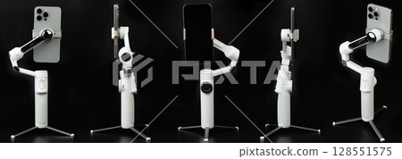 Smartphone in stabilizer gimbal 128551575