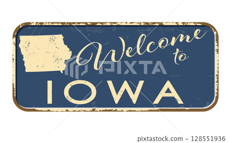 Welcome to Iowa. A worn blue plaque with the name and outline of the state. Welcome inscription on the road sign Welcome to Iowa. A worn blue plaque with the name and outline of the state. Welcome inscription on the road sign 128551936