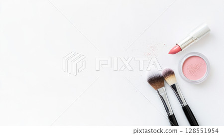 High-resolution top view of elegant makeup brushes and powder, with copy space for cosmetic shop promotions or professional makeup artist portfolio. 128551954