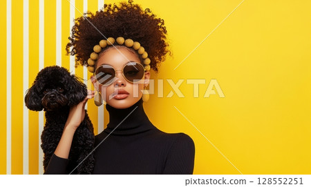 Fashionable woman with black poodle in front of New York striped buildings, wearing black turtleneck, sunglasses, and gold jewelry on yellow background, op art minimalism Fashionable woman with black poodle in front of New York striped buildings, wearing black turtleneck, sunglasses, and gold jewelry on yellow background, op art minimalism 128552251