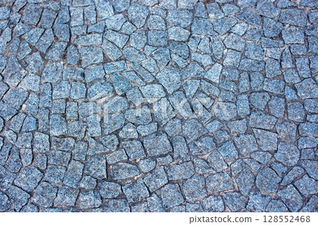 Cobblestone pavement texture. Abstract background and texture for design. Cobblestone pavement texture. Abstract background and texture for design. 128552468
