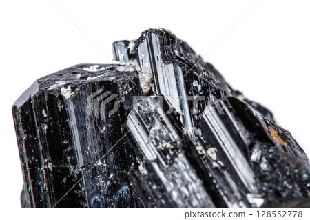 macro mineral stone sherle, schorl, black tourmaline on white background 128552778