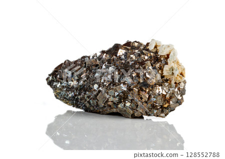 Macro mineral stone Arsenopyrite on a white background Macro mineral stone Arsenopyrite on a white background 128552788