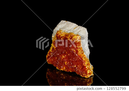 Macro Mineral Stone Orpiment on Black Background Macro Mineral Stone Orpiment on Black Background 128552799