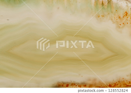 Macro mineral stone Yellow Agate breed a white background 128552824
