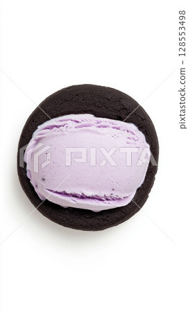 Crisp product shot of charcoal cookie ice cream sandwich with lavender hue, clean composition with copyspace for stylish summer dessert ads, menu design, or promo graphics. 128553498