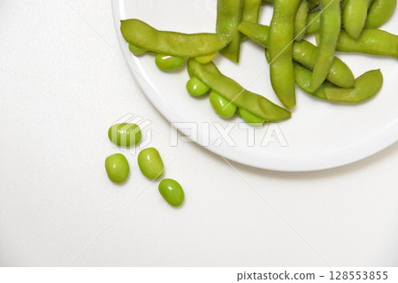 Delicious edamame beans on a plate Delicious edamame beans on a plate 128553855