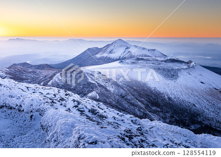 Snow-covered peaks of the Kirishima Mountains and Takachiho 128554119