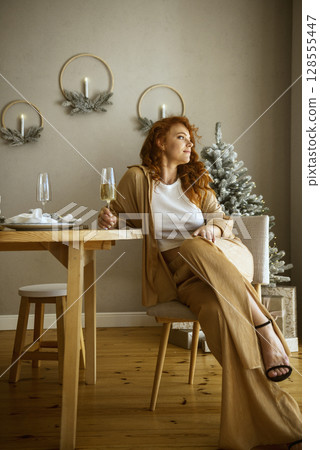 A person sitting on a table 128555447