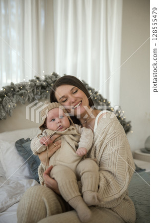 A baby wearing a hat A baby wearing a hat 128555479