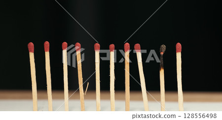 Burnt Matchstick Among New Matches – Burnout Concept 128556498