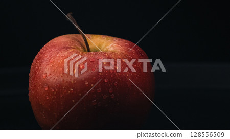 Red Apple on Black Background - Minimalist Still Life Red Apple on Black Background - Minimalist Still Life 128556509