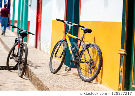 Bicycle at the beautiful streets of the colonial town of Concepcion in Antioquia, Colombia. Bicycle at the beautiful streets of the colonial town of Concepcion in Antioquia, Colombia. 128557217