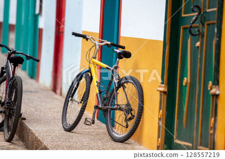 Bicycle at the beautiful streets of the colonial town of Concepcion in Antioquia, Colombia. 128557219