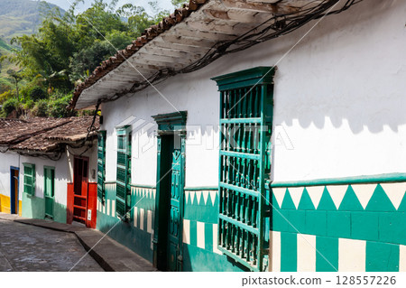 Beautiful streets and mountains of the colonial town of Concepcion in Antioquia, Colombia. Beautiful streets and mountains of the colonial town of Concepcion in Antioquia, Colombia. 128557226
