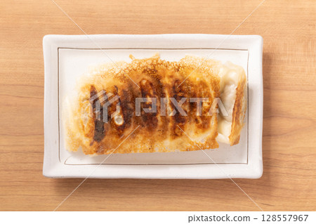 Fried dumplings with wings 128557967