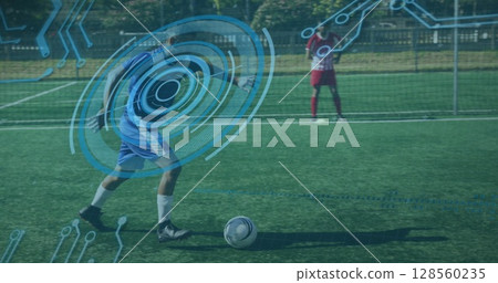 Image of scope scanning and data processing over football player kicking ball 128560235