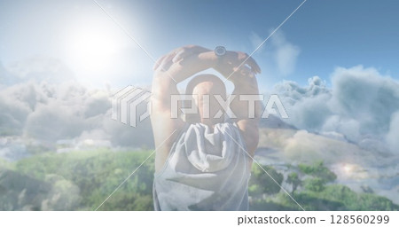 Image of glowing lights over senior man exercising and clouds background 128560299
