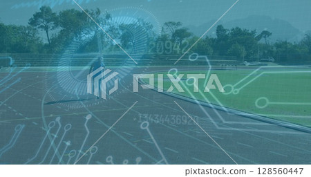 Image of data processing over disabled male athlete with running blades on racing track Image of data processing over disabled male athlete with running blades on racing track 128560447