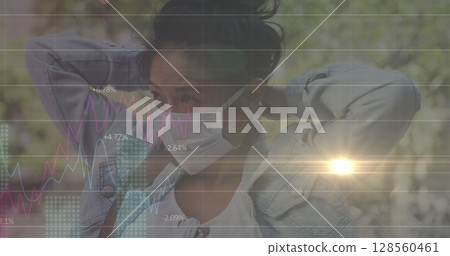 Image of data processing over woman wearing face mask Image of data processing over woman wearing face mask 128560461