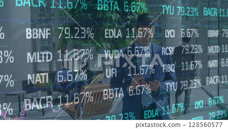Image of financial data processing over businessman Image of financial data processing over businessman 128560577