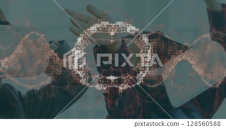 Image of human brain and dna strand over business people wearing vr headsets Image of human brain and dna strand over business people wearing vr headsets 128560588