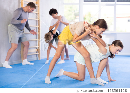 Two girls training self-defense techniques Two girls training self-defense techniques 128561128