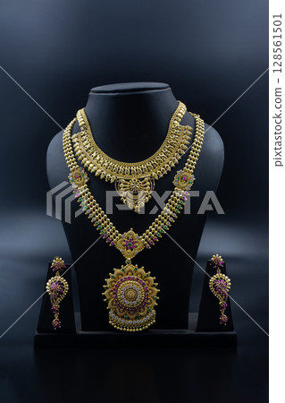 Heavy Traditional Indian Bridal Gold Necklace Set with Earrings on Display 128561501