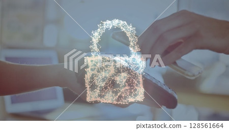 Image of network security padlock over people using payment terminal Image of network security padlock over people using payment terminal 128561664