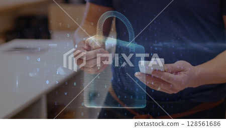 Image of network security padlock over people using payment terminal 128561686