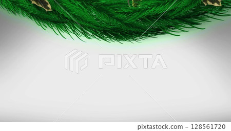 Decorative with spruce branches, holly and red berries against grey background 128561720