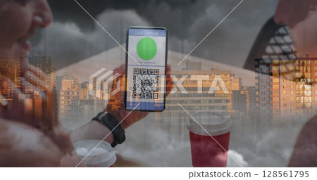 Image of woman holding smartphone with covid 19 vaccination passport over cityscape Image of woman holding smartphone with covid 19 vaccination passport over cityscape 128561795