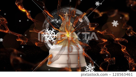 Snowflakes floating and shooting star around christmas tree in a snow globe against black background 128563461