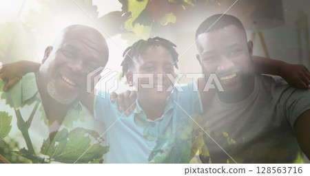 Composite of happy african american son, father and grandfather embracing, with sunlight and nature Composite of happy african american son, father and grandfather embracing, with sunlight and nature 128563716