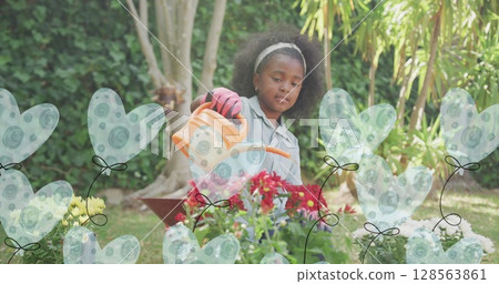 Animatin of heart ballons over african american girl watering plants in garden 128563861
