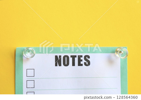 note paper blank on yellow background note paper blank on yellow background 128564360
