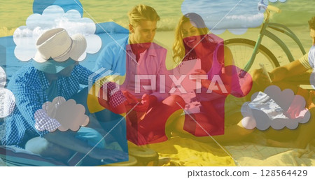 Image of colourful puzzle pieces over happy friends using tablet 128564429