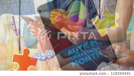 Image of colourful puzzle pieces and autism text over friends using smartphone and tablet Image of colourful puzzle pieces and autism text over friends using smartphone and tablet 128564491