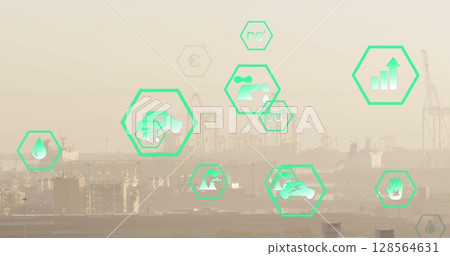 Multiple green energy icons floating against aerial view of cityscape 128564631
