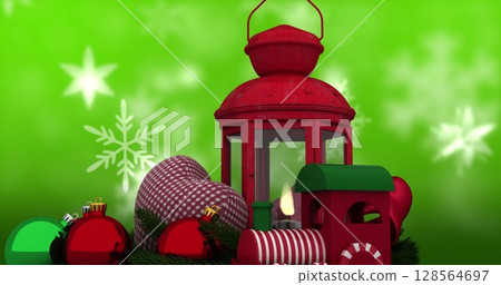 Image of christmas decorations over snowflakes 128564697