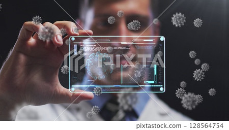 Image of covid cells over male doctor holding screen with medical data processing 128564754