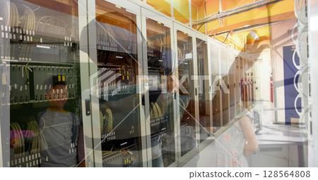 Image of computer server over schoolboy wearing vr headsets Image of computer server over schoolboy wearing vr headsets 128564808