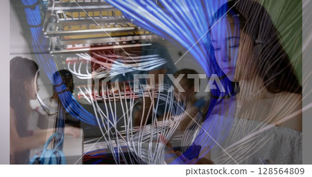 Image of computer server over schoolgirl wearing tablet Image of computer server over schoolgirl wearing tablet 128564809