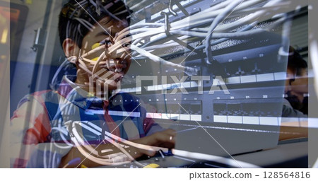 Image of computer server over students using computers Image of computer server over students using computers 128564816