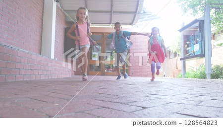 Image of happy teachers day text over diverse schoolchildren smiling and running Image of happy teachers day text over diverse schoolchildren smiling and running 128564823
