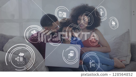 Image of network of icons over couple and son using laptop Image of network of icons over couple and son using laptop 128564852