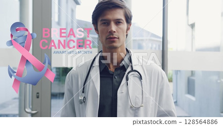 Image of breast cancer awareness text over smiling caucasian male doctor at hospital 128564886