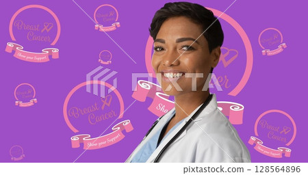 Image of breast cancer awareness text over smiling african american female doctor Image of breast cancer awareness text over smiling african american female doctor 128564896